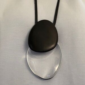 Monies 5” Black and Clear Pendant Necklace on leather cord. Total length is 24”